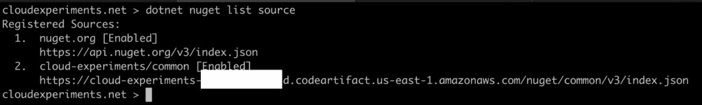 Terminal window showing the registered NuGet sources including the private CodeArtifact repository