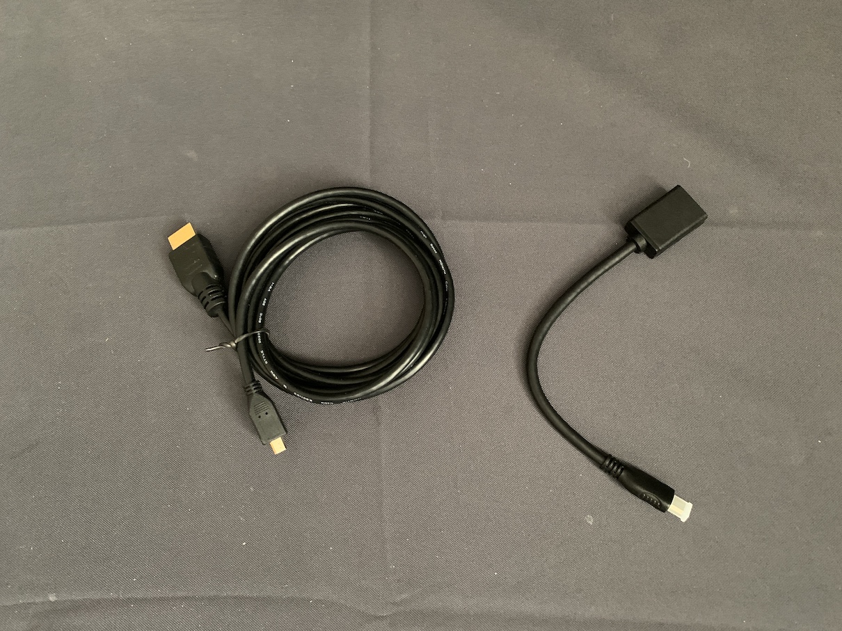 On the left, HDMI to Micro HDMI cable. On the right, HDMI to Micro HDMI adapter.