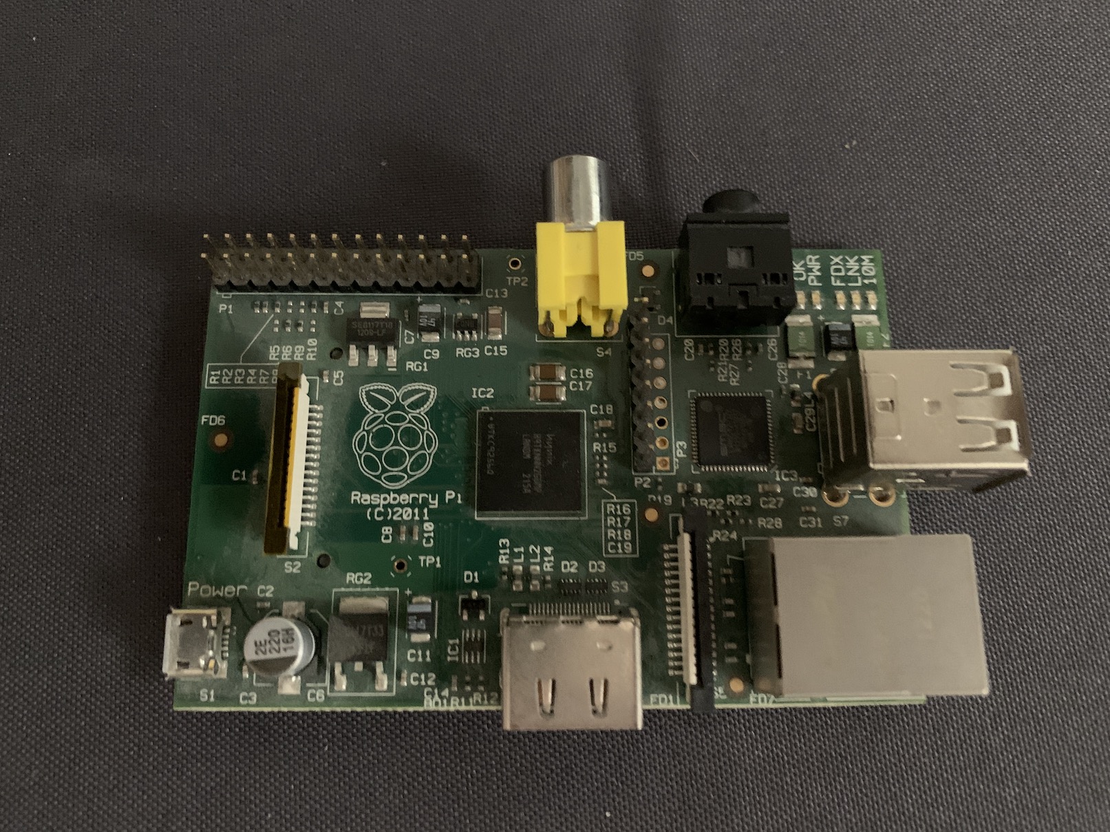 Image of an old Raspberry Pi Model B manufactured in 2011
