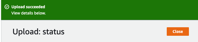 Upload status showing success and a close button